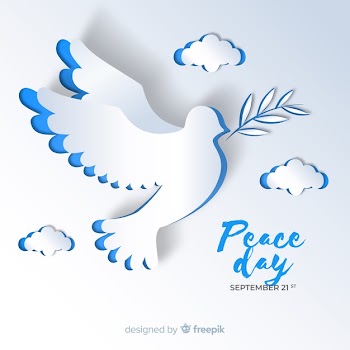 Peace day background with dove Free Vector