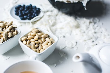 Peeled almonds with coconut and blueberries 