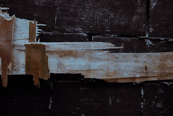 Peeled Off Wood On Black Wall