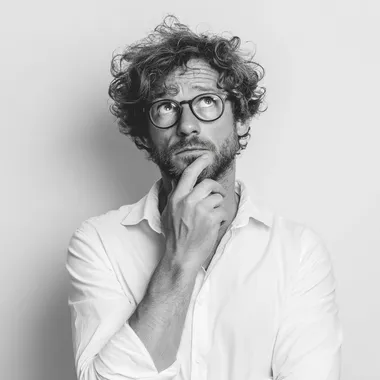 Pensive Man in White Shirt