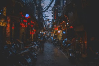 People Along Narrow Alley