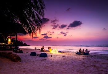 People At The Shore During Golden Hour