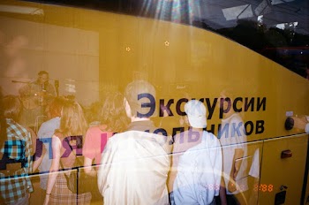 People Behind Glass