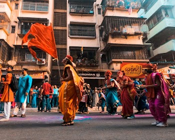 People Celebrating Near Building