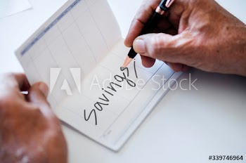 People checking bankbook isolated on white table