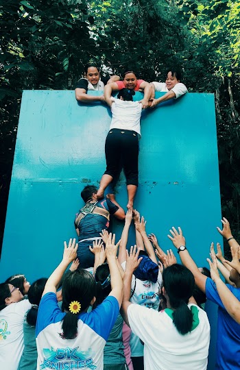 People Climbing Wall