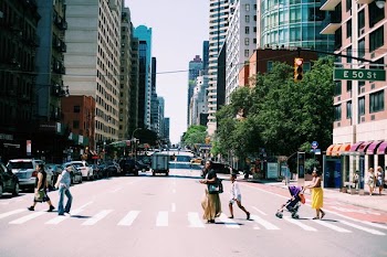 people crossing pedestrian lane