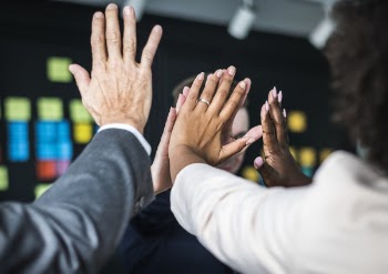 People Doing A High Five