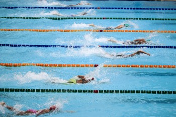People Doing Swim Race