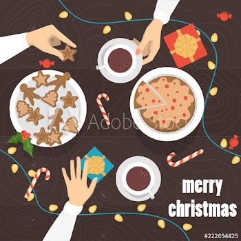 People drinking tea with gingerbread at christmas table