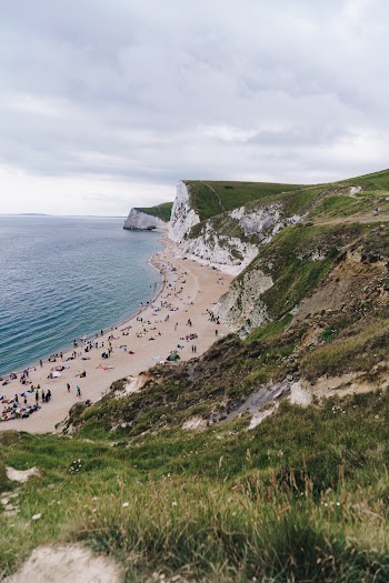 People Enjoying The Beach