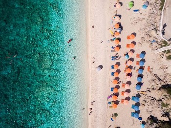 people enjoying the beach