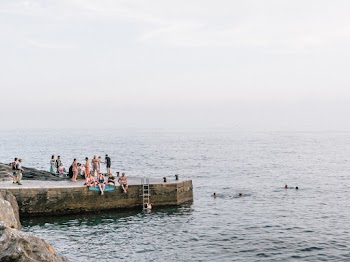 People Gathered Near Sea