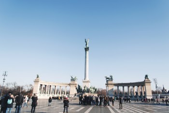 People Gathering in Front of Monument