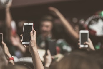 People Holding Smartphones