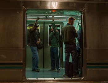 People in a Gray Train