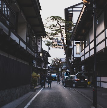 People in Between Houses