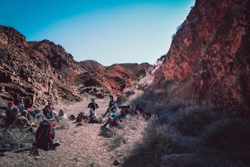 People in Middle of Hills