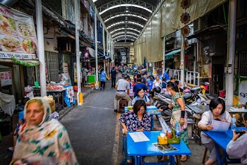 People in Restaurants in Alley