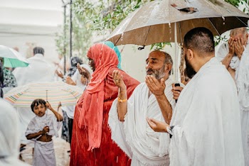 People In Robes On A Rainy Day