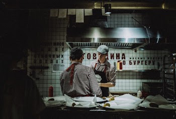 People Inside Commercial Kitchen