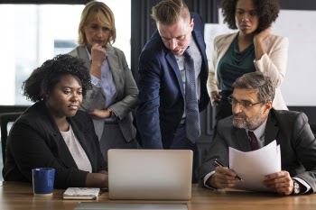 People Inside Conference Room Discussing