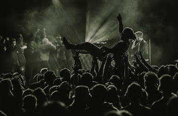 People Lifting Man