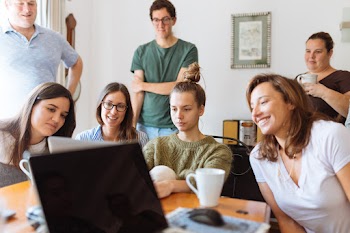 People Looking at Laptop Computer · Free Stock Photo