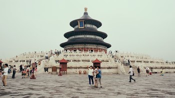 people near temple during day