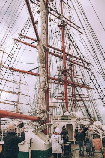 People Near White Sailship
