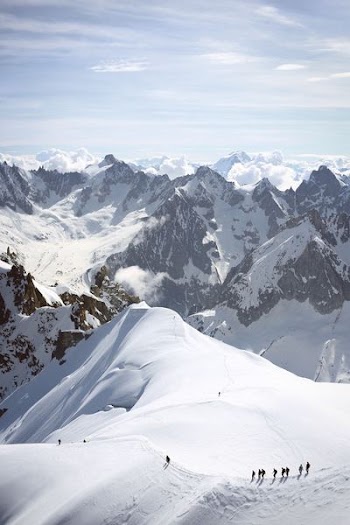 people on snow-coned mountain at daytime