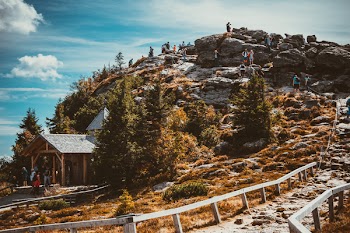 People on Top of Hill
