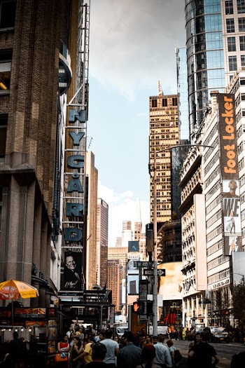 People Passing By Buildings