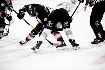 People Playing Ice Hockey