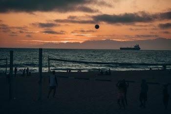People Playing Volleyball during Golden Hour