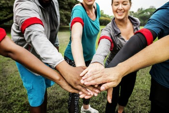 People Putting Hands Together