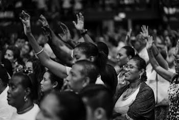 People Raising there Arms
