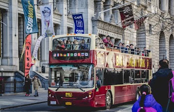 People Riding Double Decker Bus 