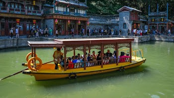 People Riding On Boat