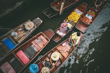 people rowing boat