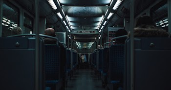 People Seated Inside a Train