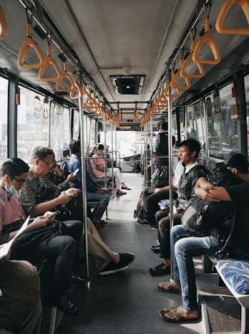 People Sitting Inside the Train