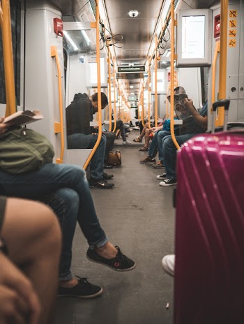 People Sitting Inside Train