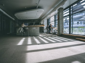 People Sitting on Bar Stools