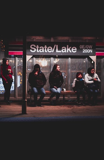 People Sitting On Bench
