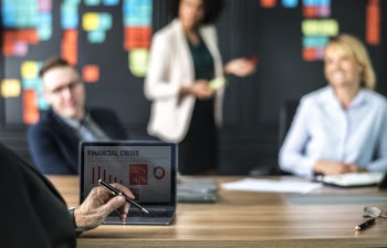 People Sitting on Conference Table