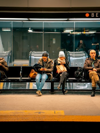 People Sitting on Gang Chairs