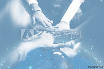 People stacking hands