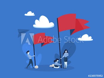 People standing and holding big red flag
