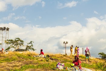 People Standing and Sitting